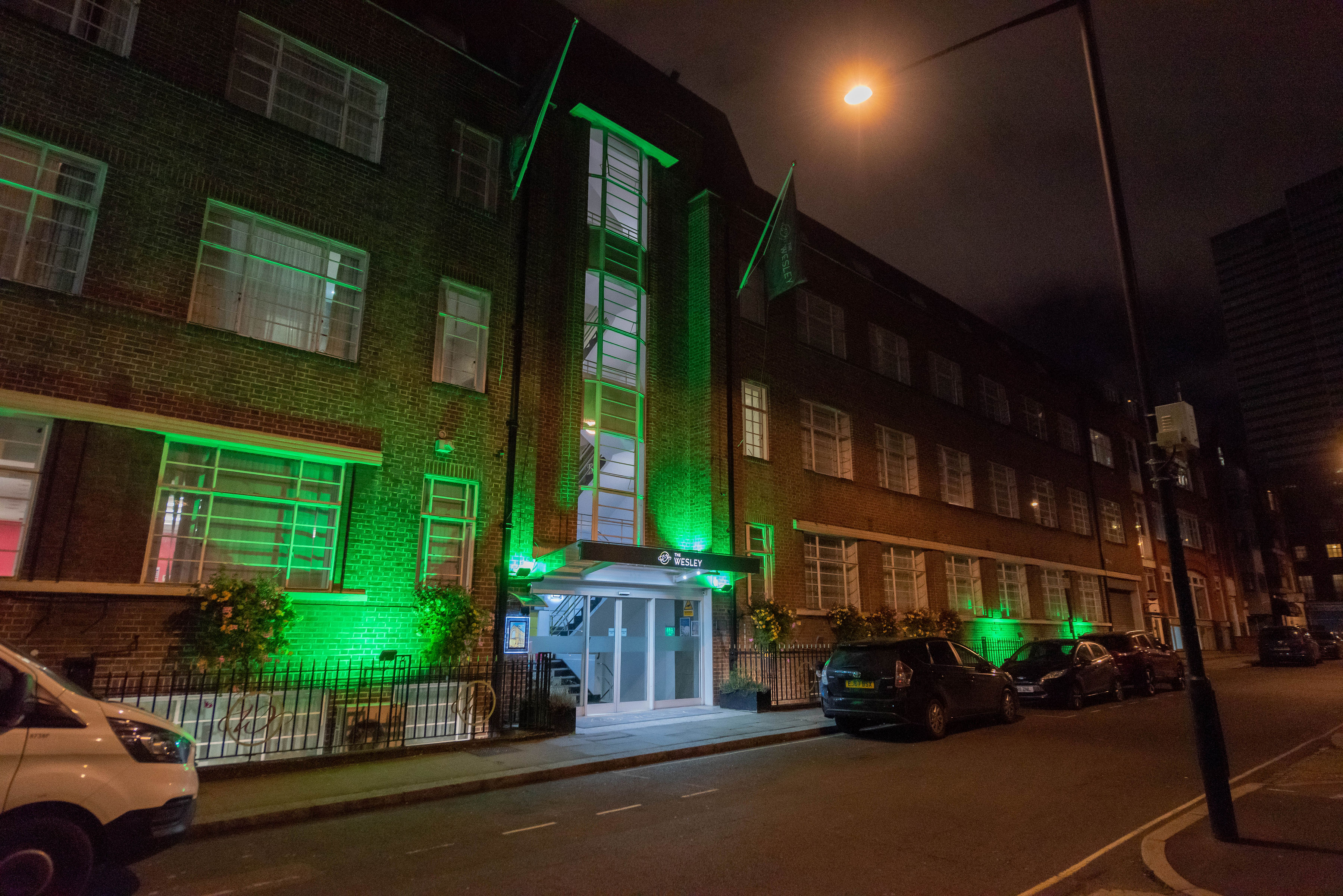 Exterior of The Wesley at night