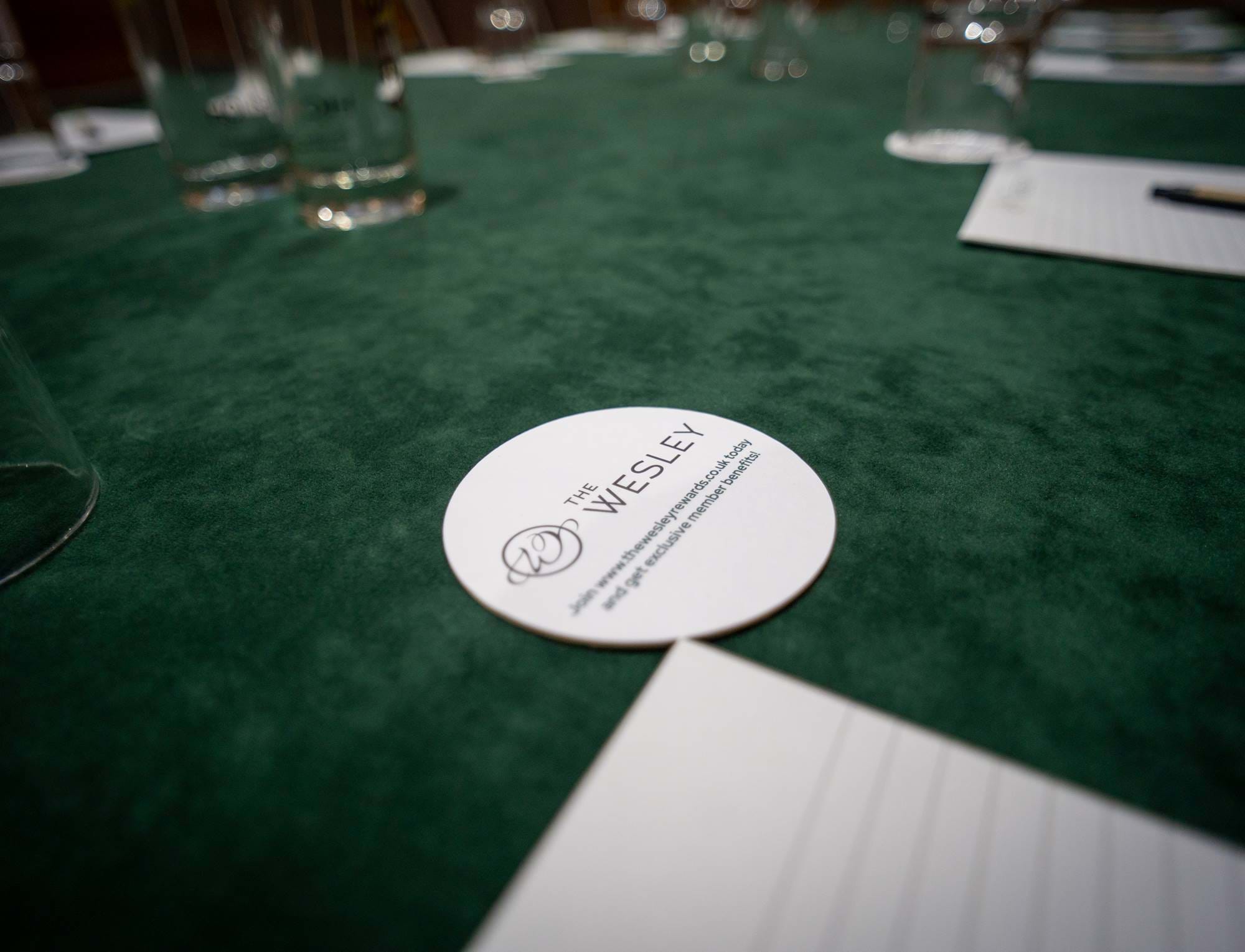 Close up of a coaster on the table at The Wesley