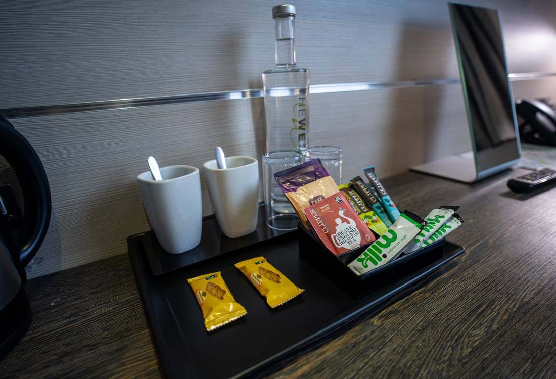 Coffee and tea station in the bedroom at The Wesley