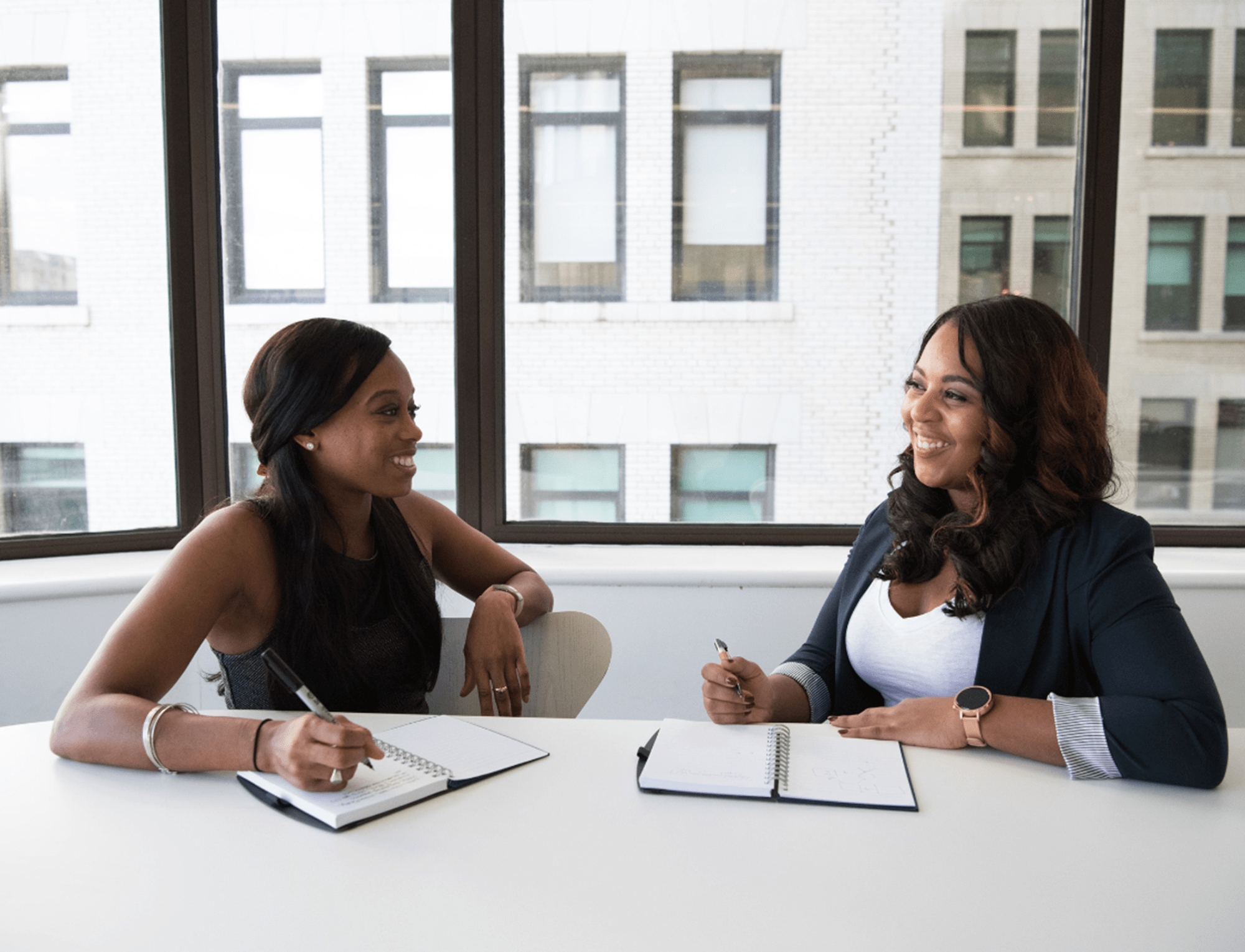 Two professionals have a meeting at The Wesley London Euston