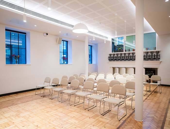 a front shot of The Wesley Camden Town's hotel meeting room. This central london meeting room houses 72 attendees - perfect for a business networking event in London.