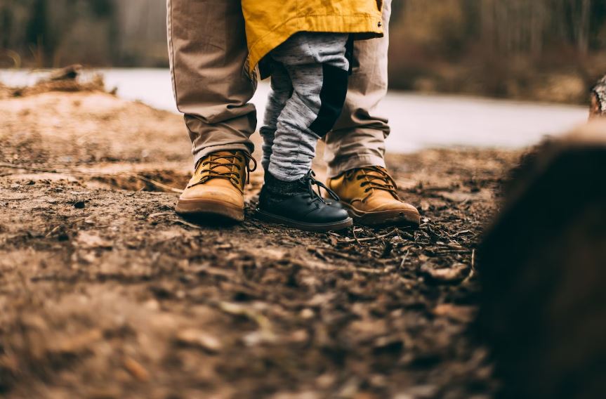 Close up of a parents and childs feet