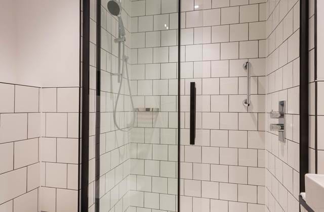 Tiled bathroom at The Wesley