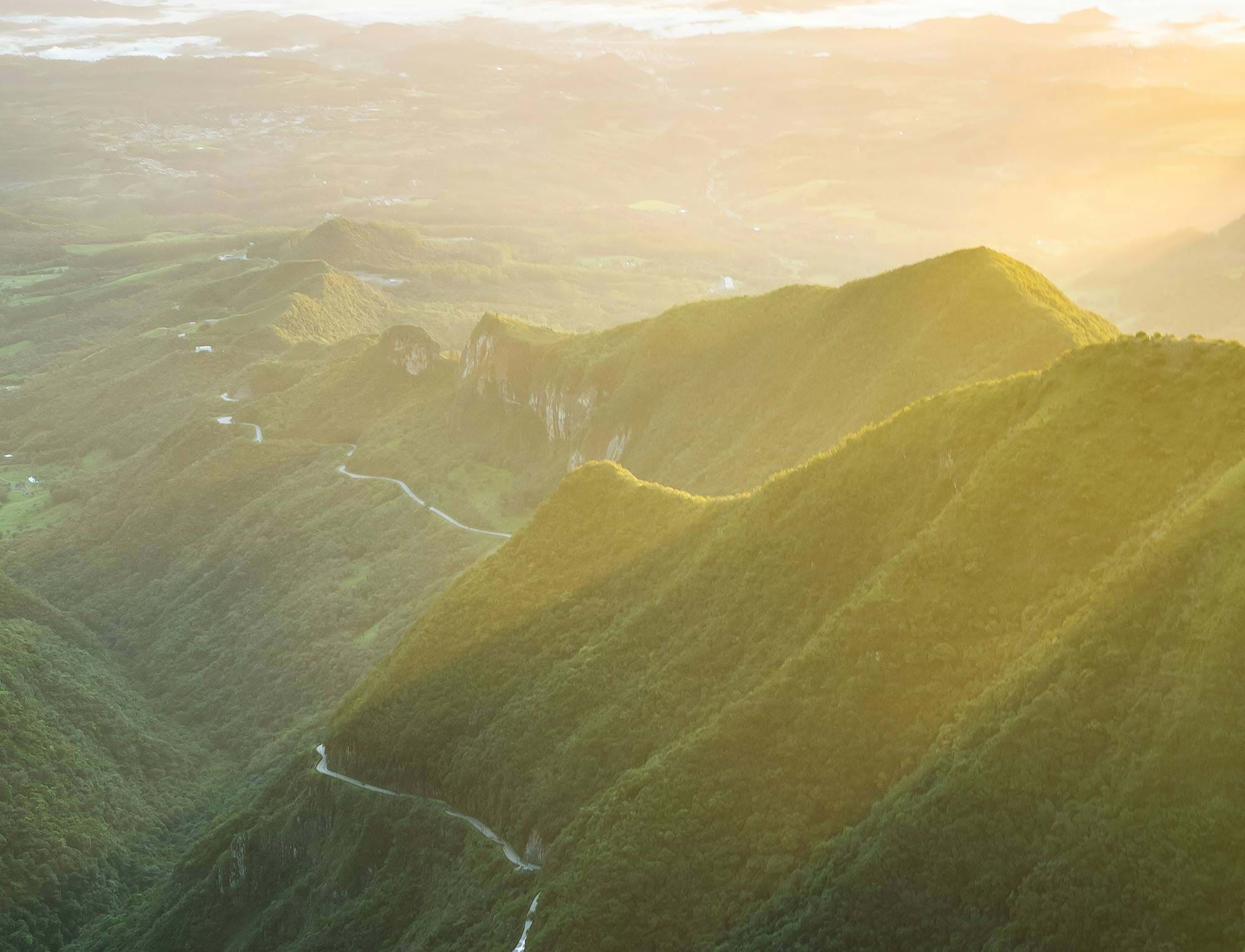 Aerial view of green hill landscape